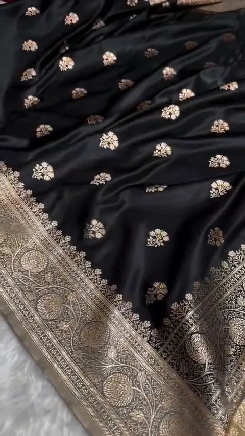 Video of the black banarasi mashru silk butta saree showing the drape and zari