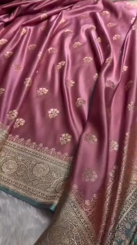 Video of the onion pink banarasi mashru silk butta saree showing the drape and zari