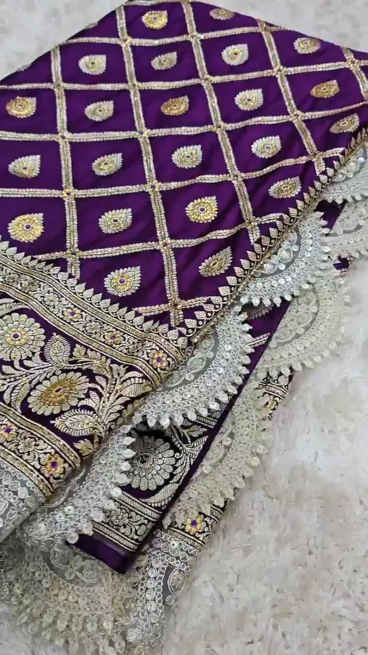 Video of the purple banarasi mashru silk dardozi saree showing the drape and zari