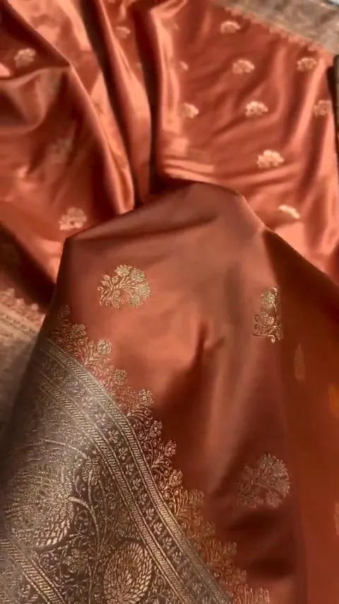 Video of the rust copper banarasi mashru silk butta saree showing the drape and zari